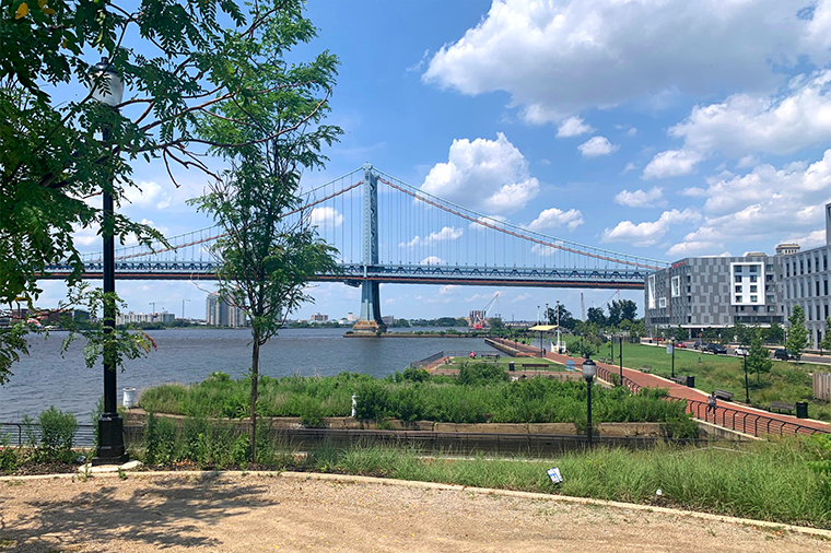 A photo of the Camden Waterfront and Ben Franklin Bridge