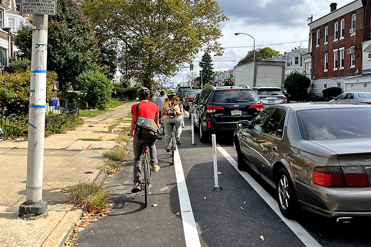 Bicyclists using a protected bike lane